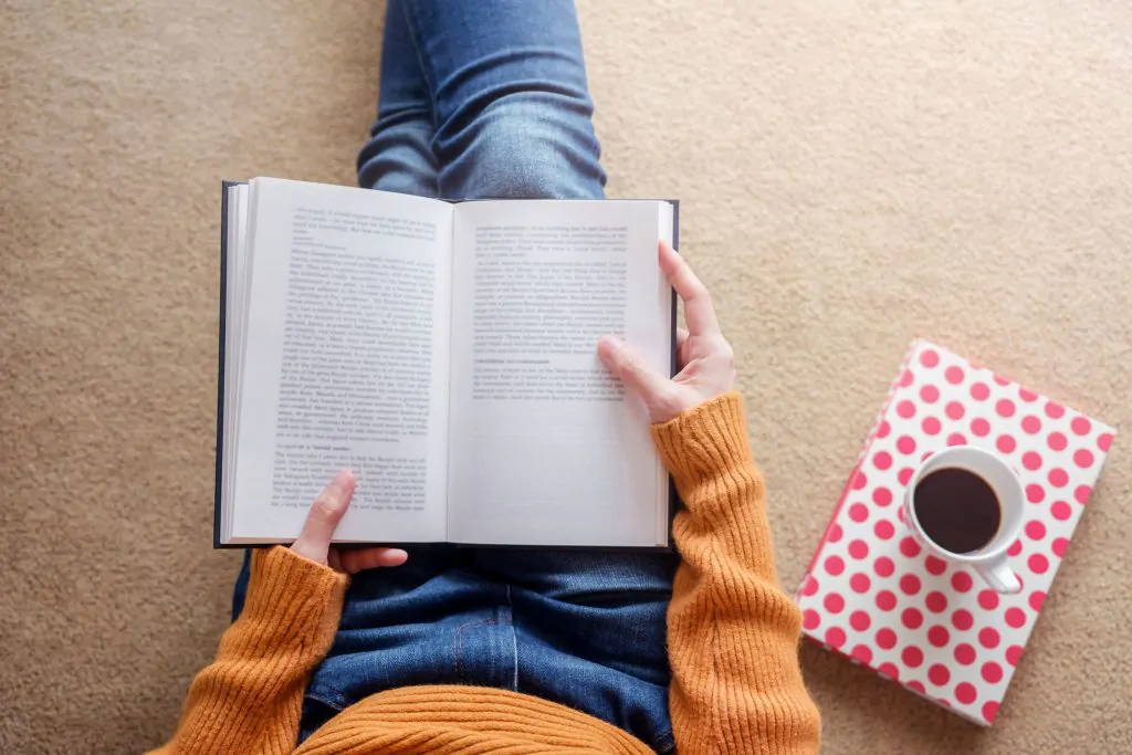 How to improve mental health 2. Reading books (A person reading book)